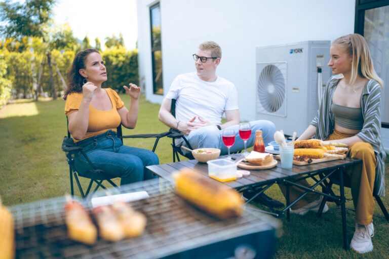 adults enjoying a backyard barbecue on a sunny day 2026 01 09 07 08 57 utc Srednie